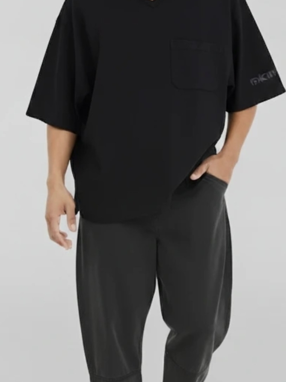 DKNY Black Oversized Pocket Tee with Subtle Sleeve Logo
